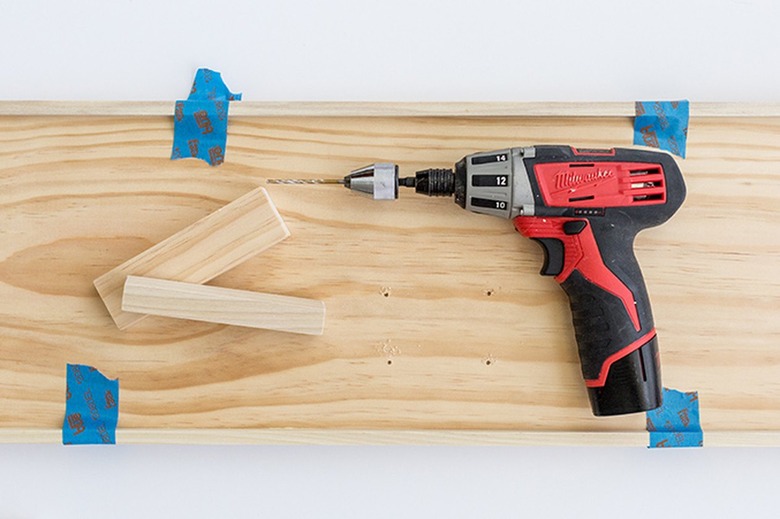 Wood board and power drill