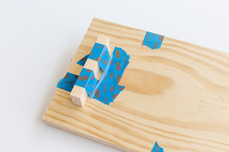 Wood tray with blue painter's tape