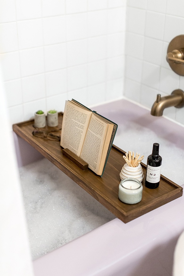 Wood bath tray with reading glasses