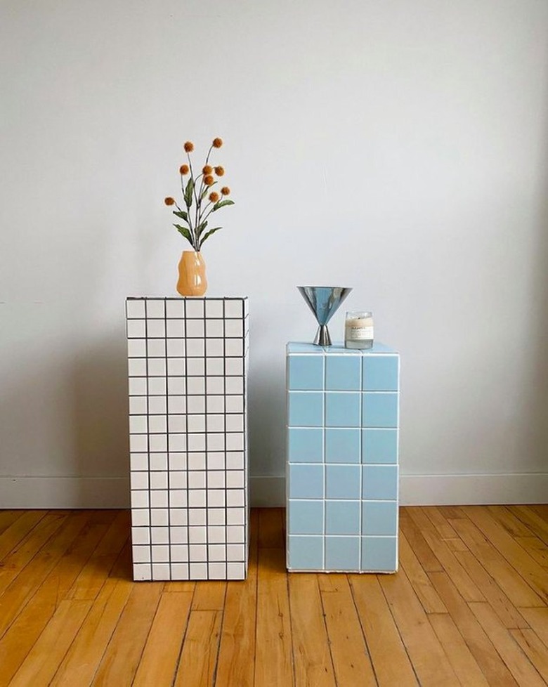 Tiled end tables with vases