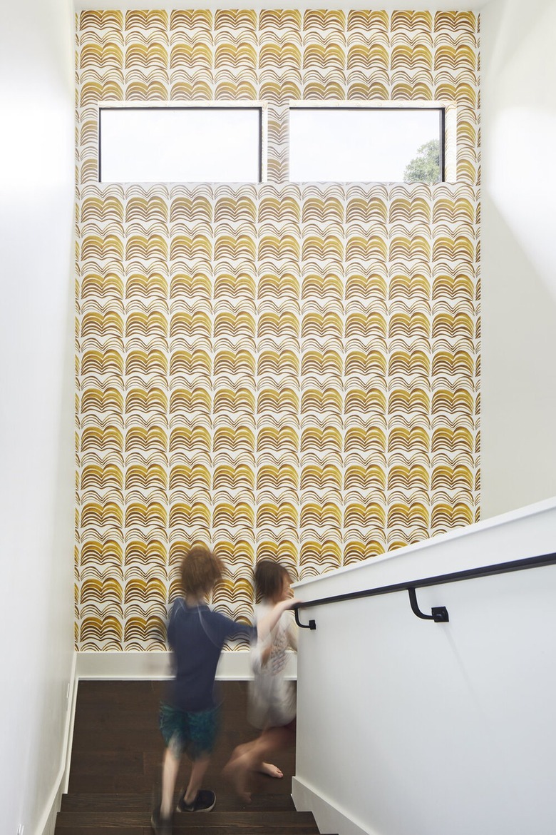 patterned wallpaper in staircase space