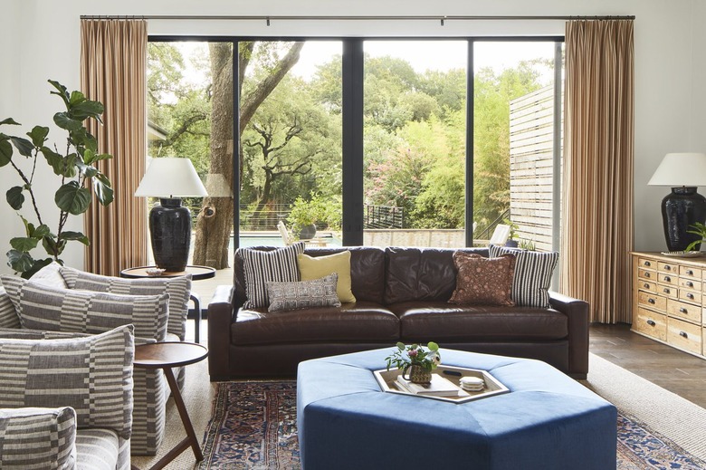 living room area with couch and hexagonal coffee table