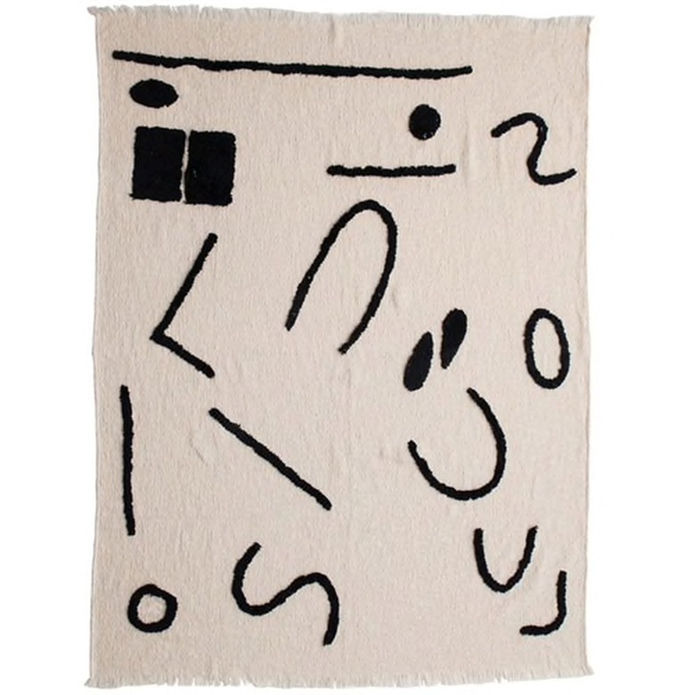 cream blanket with abstract pattern