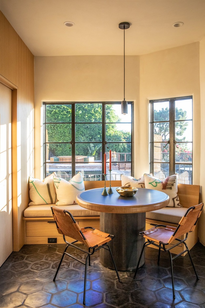breakfast nook with bench seating and round table