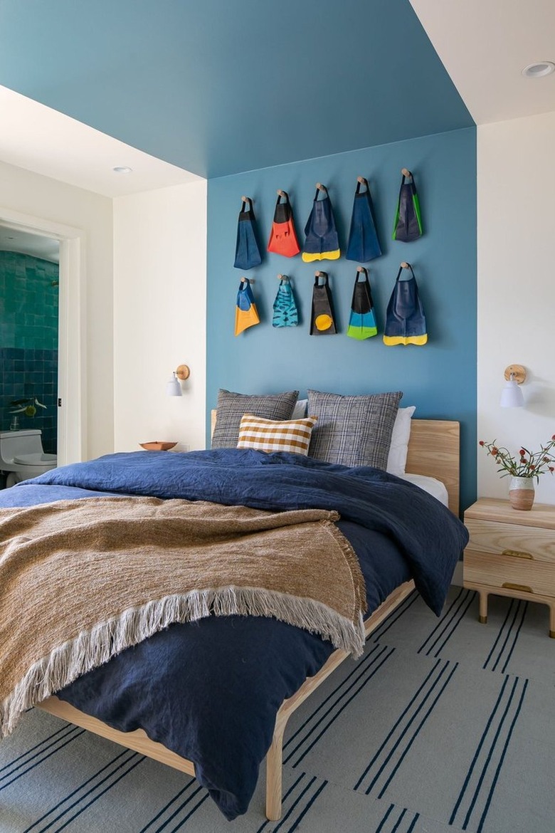 bedroom with powder blue paint on wall and ceiling