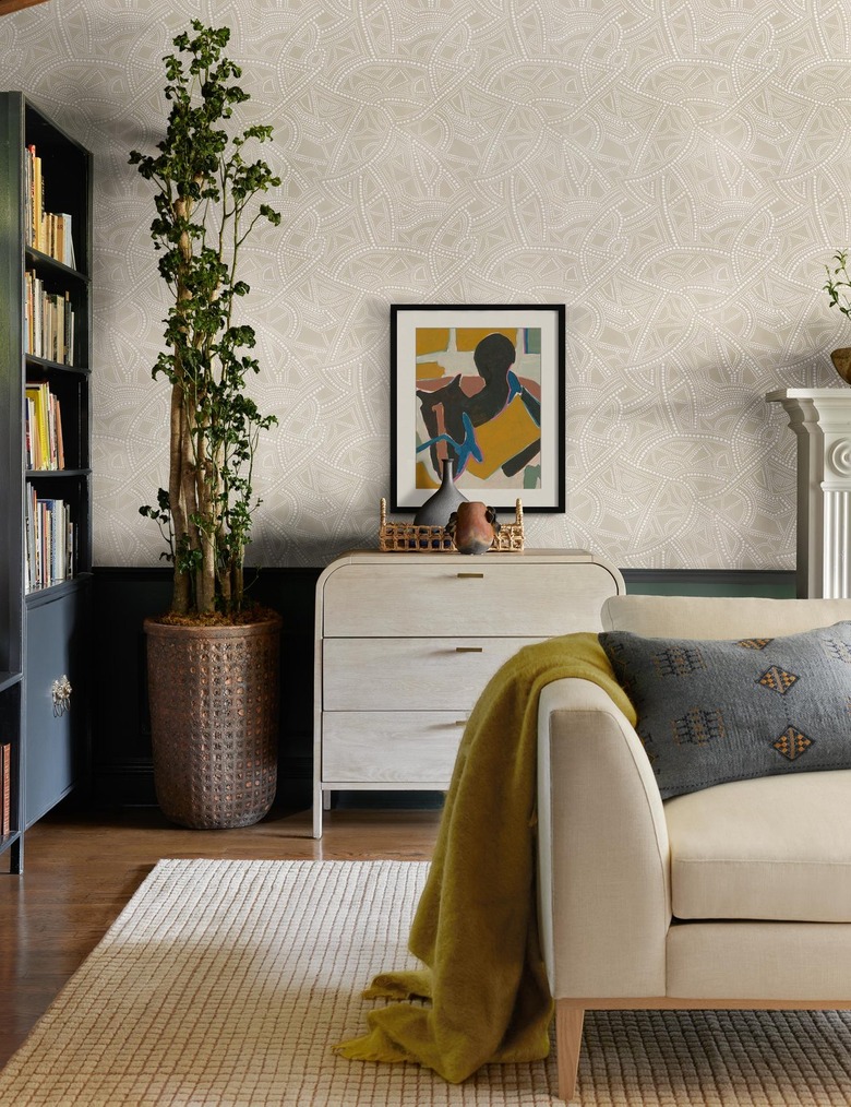 living room with patterned wallpaper
