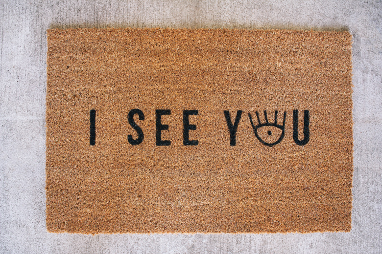 Finished doormat that says I See You