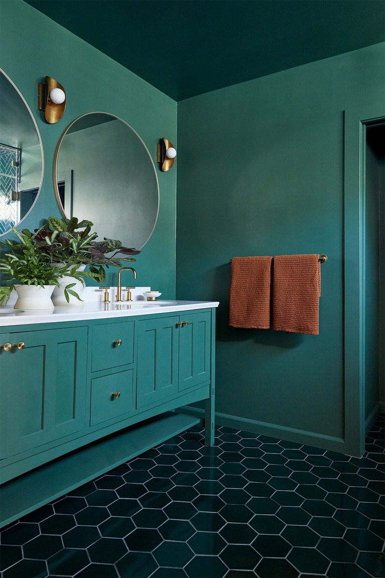 maximalist bathroom with green walls