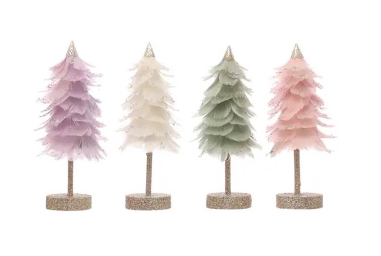 A line of four feather trees with gold