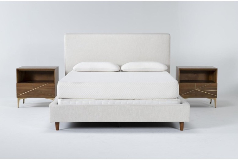 Upholstered bed with side tables