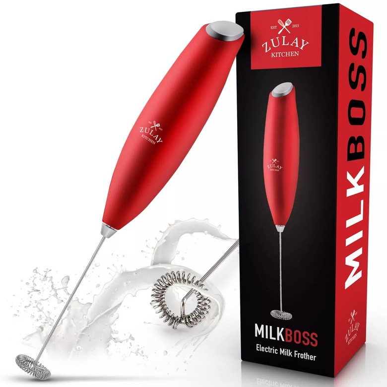 red milk frother next to box that read milk boss