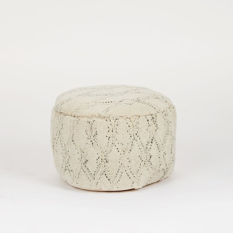 White pouf with subtle black design