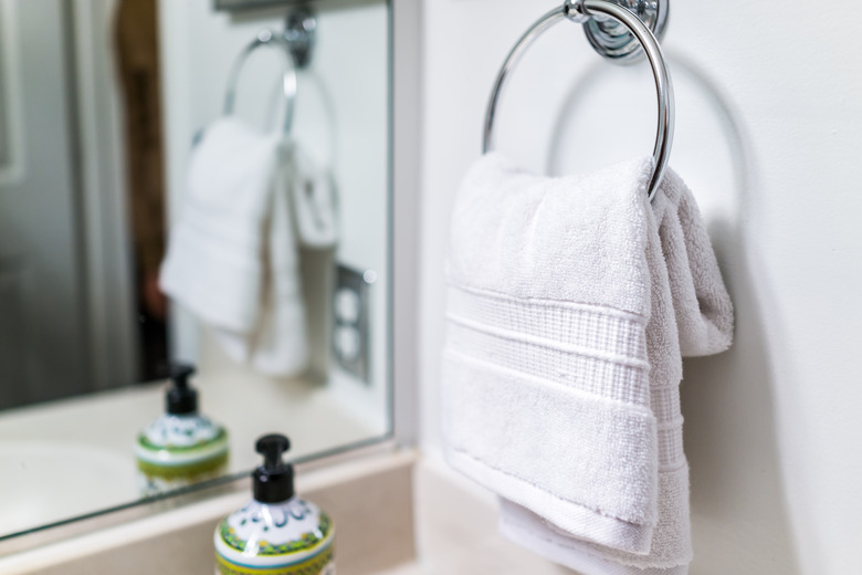 How high do you hang a towel bar discount