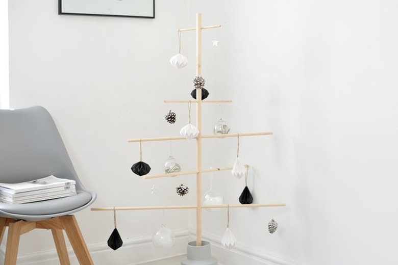 Modern Christmas decor with wood Christmas tree with black