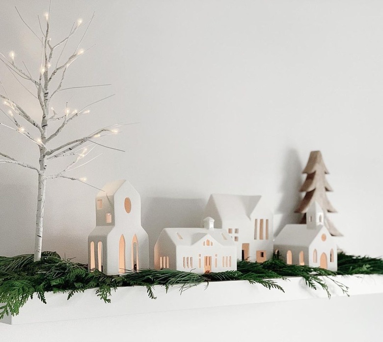 White mantel with white Christmas decor