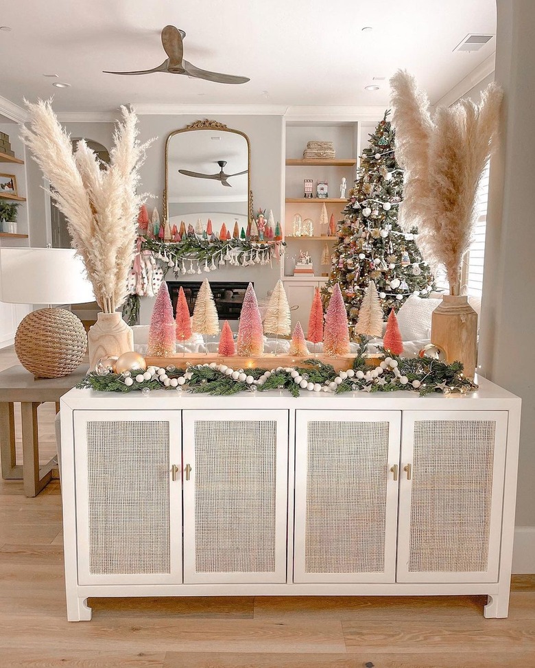 Boho Christmas decor with pink bottle-brush mini trees