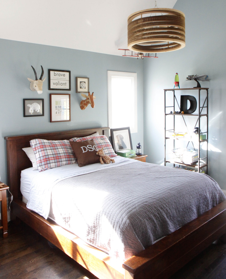 teen bedroom with statement wooden ceiling light
