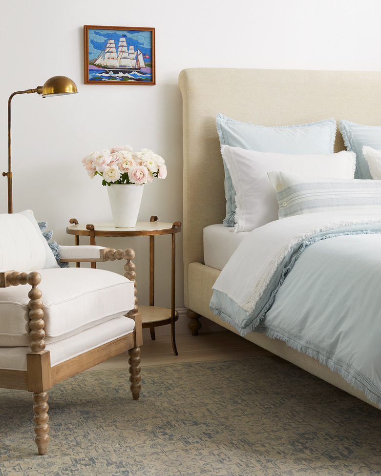 brass floor lamp in modern farmhouse bedroom