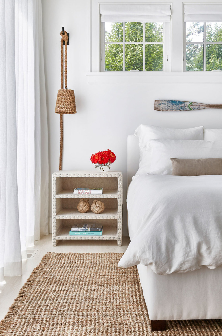 hanging rattan wall lamp in modern farmhouse bedroom