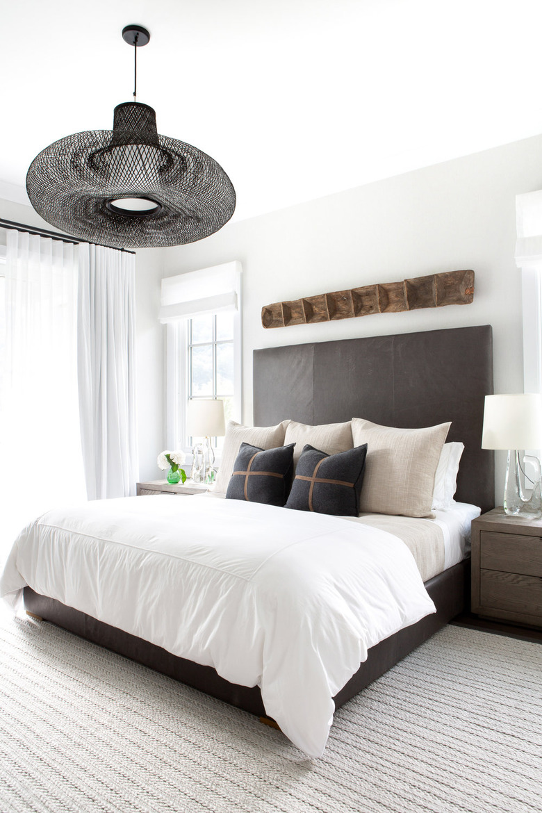 large wire ceiling light in modern farmhouse bedroom
