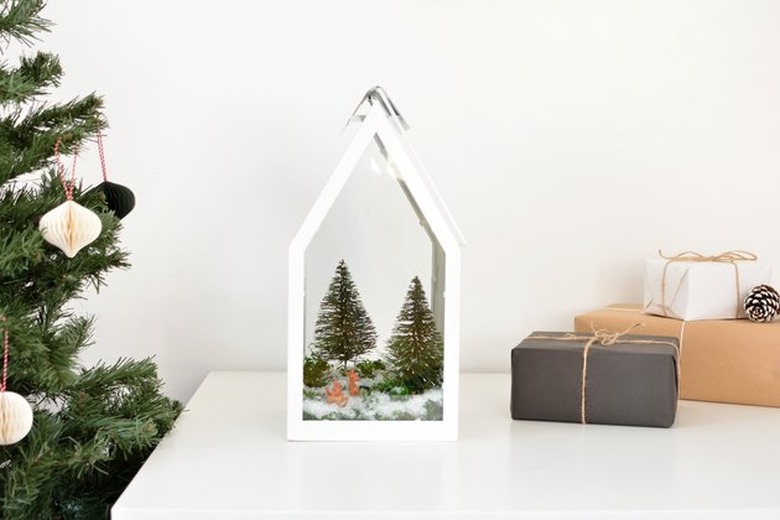 winter terrarium scene inside lantern