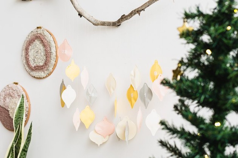 DIY paper advent calendar hanging on wall