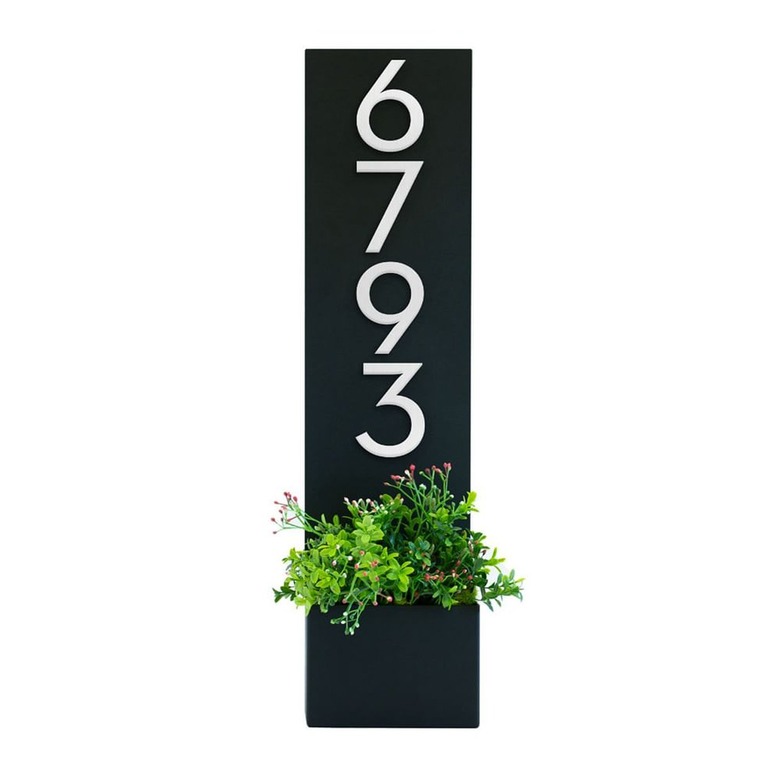 modern house numbers on planter