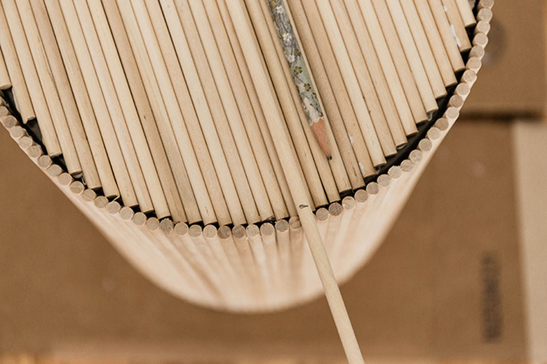 Mark the dowels to size with a pencil