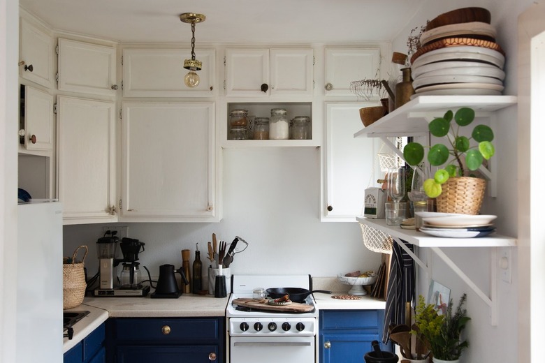 Kitchen with blue and white cabinets