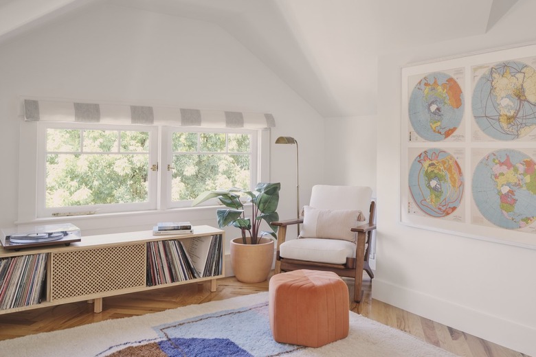 converted attic with sitting area for listening to music
