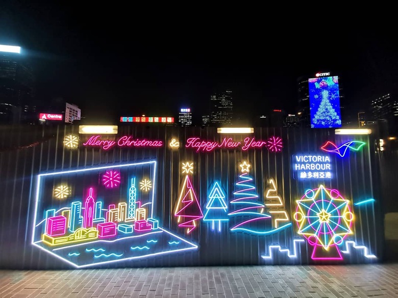Christmas-themed neon wall installation