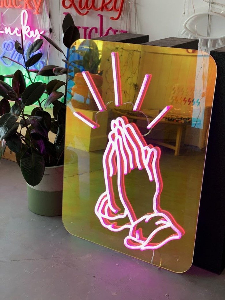 Neon prayer hands