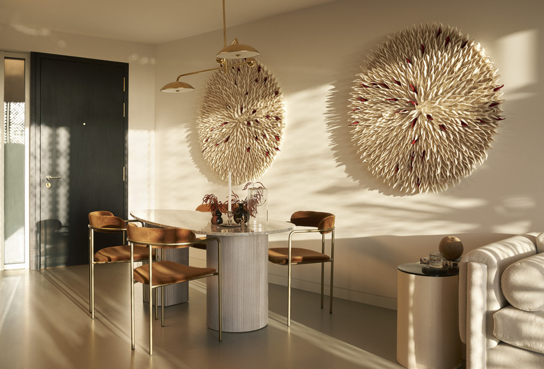 modern dining room with curved furniture