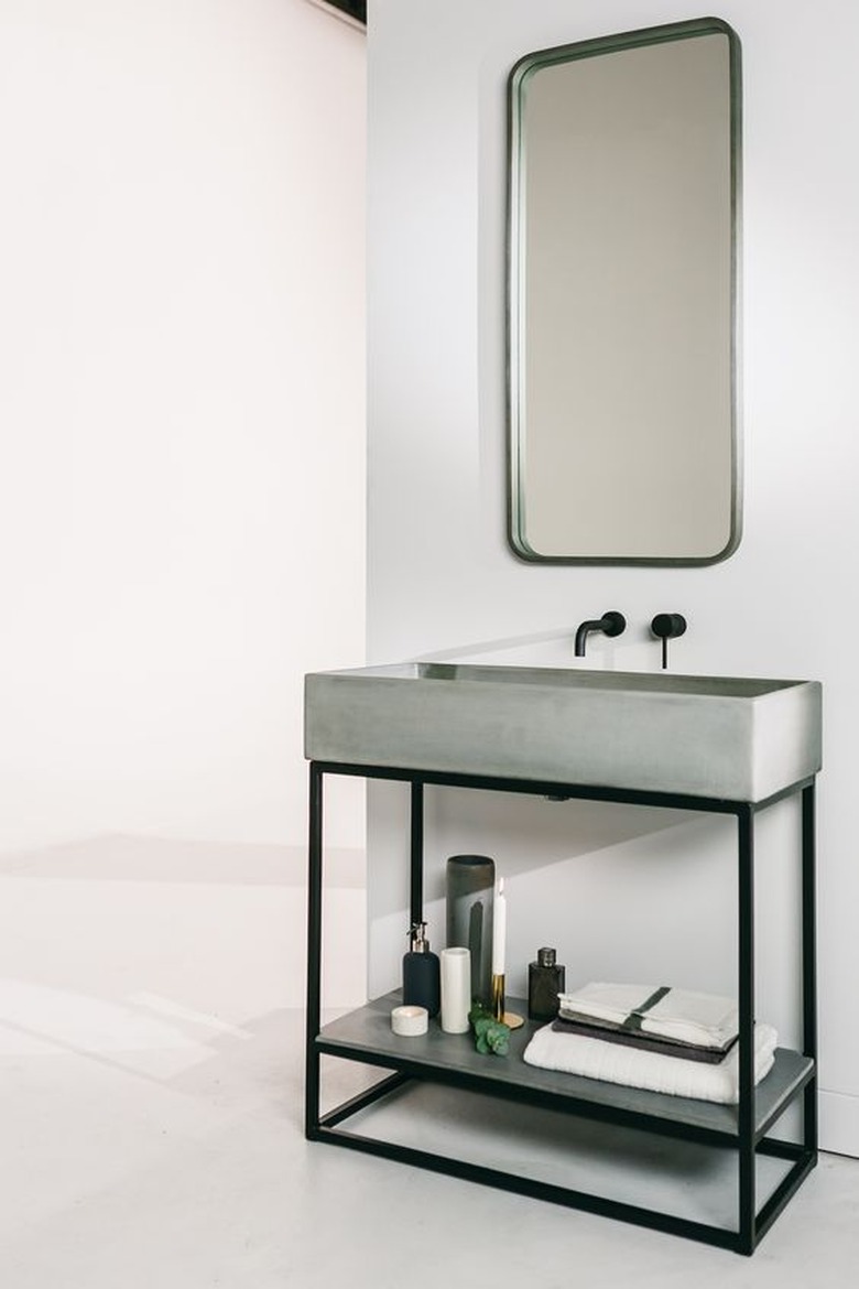 concrete and steel open bathroom vanity