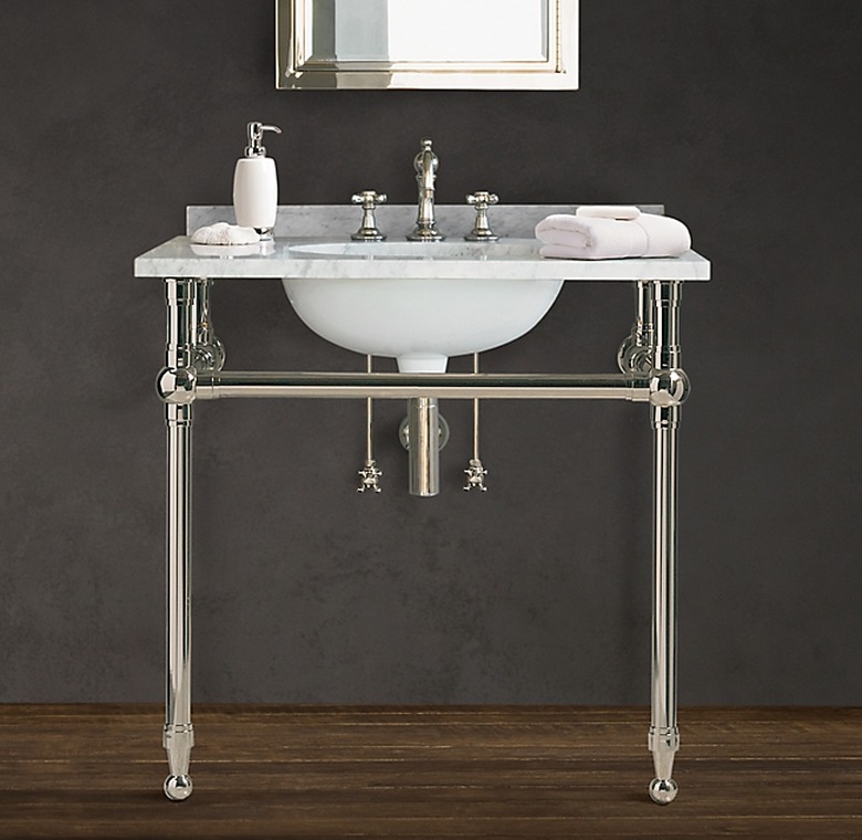 console style open vanity with marble countertop and polished chrome fixtures