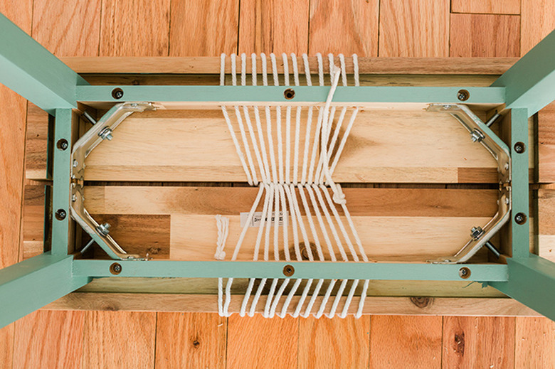 Push the rope strands to the center and staple in place.