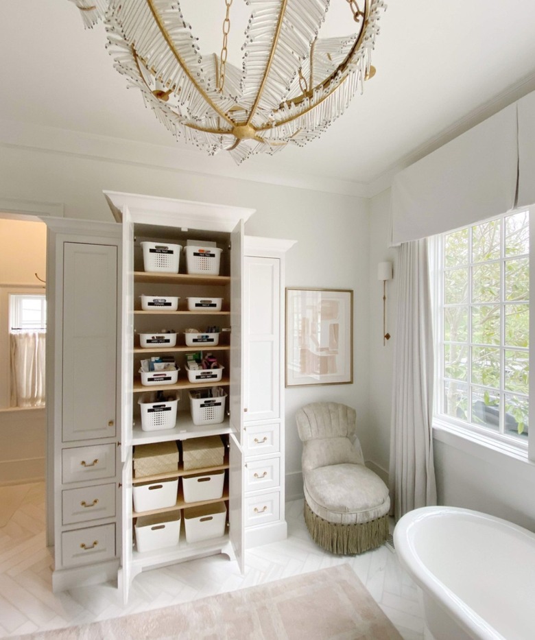 Bathroom with built-in storage cabinets