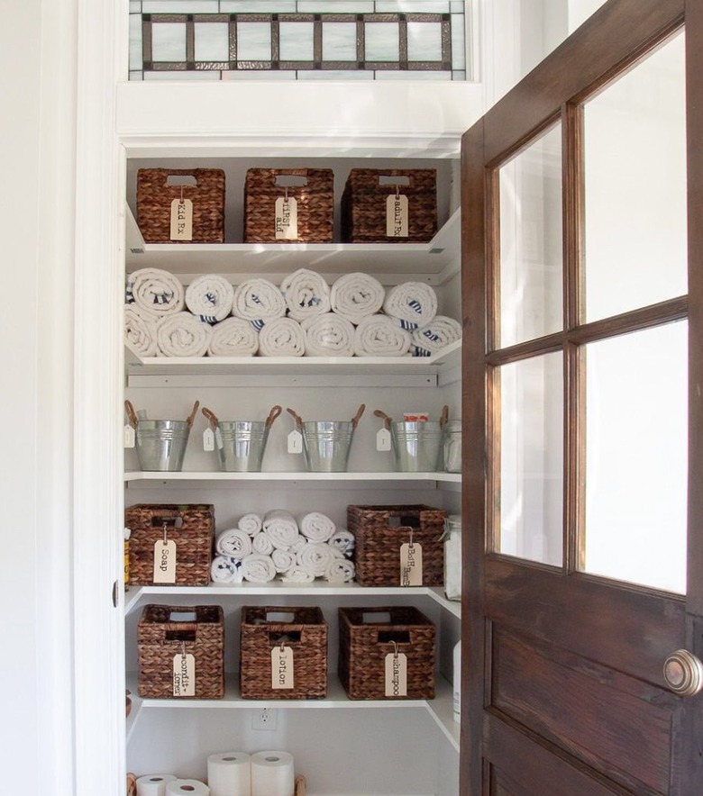 Linen closet with baskets