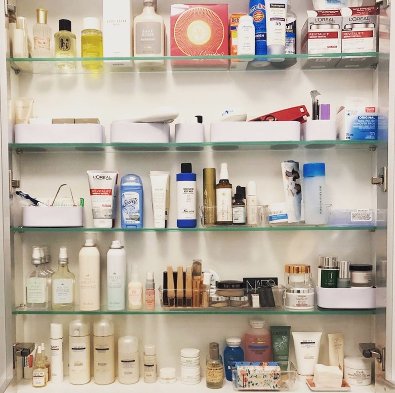 Close up of organized medicine cabinets.