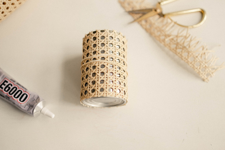 Cane webbing glued around empty soup can