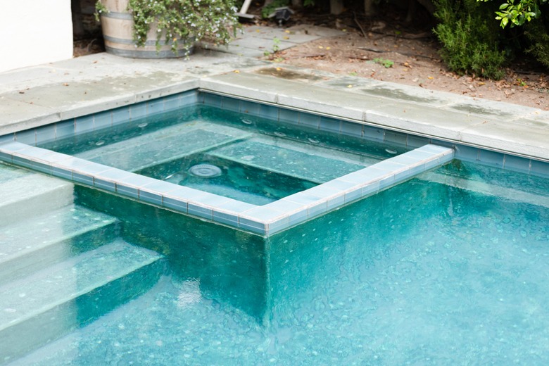 jacuzzi built in to pool