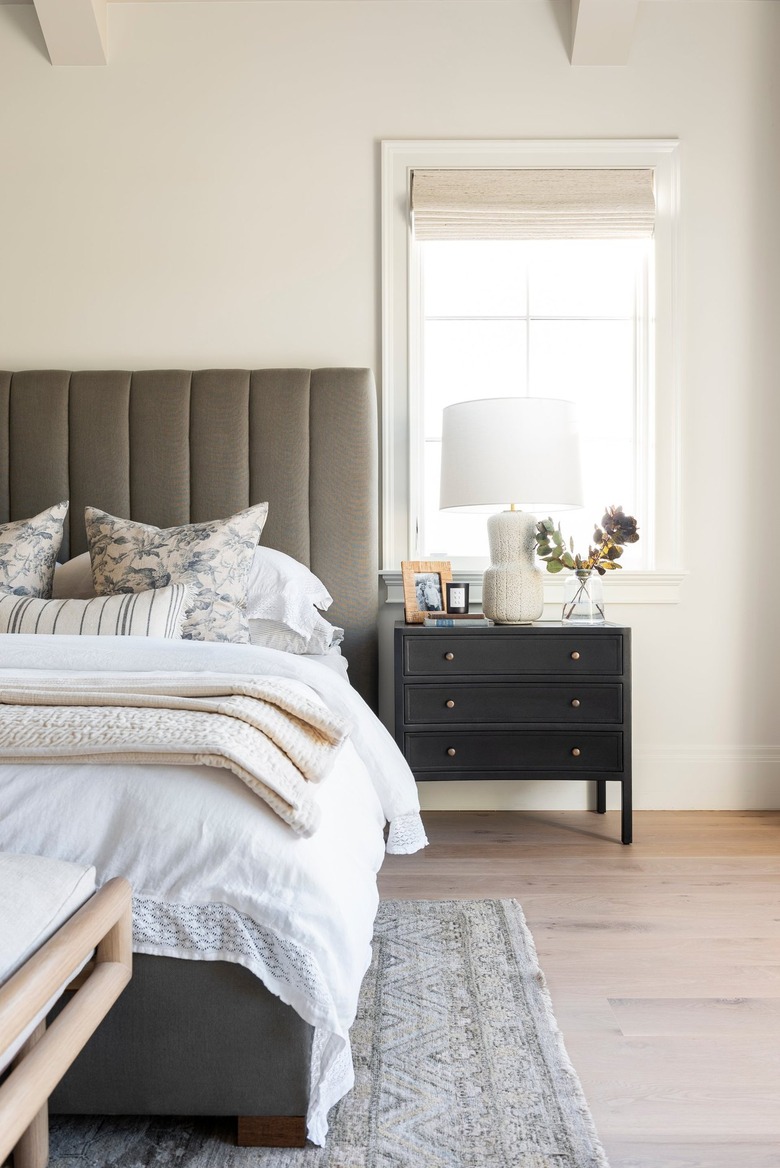 Studio McGee dark bedroom furniture with cream walls