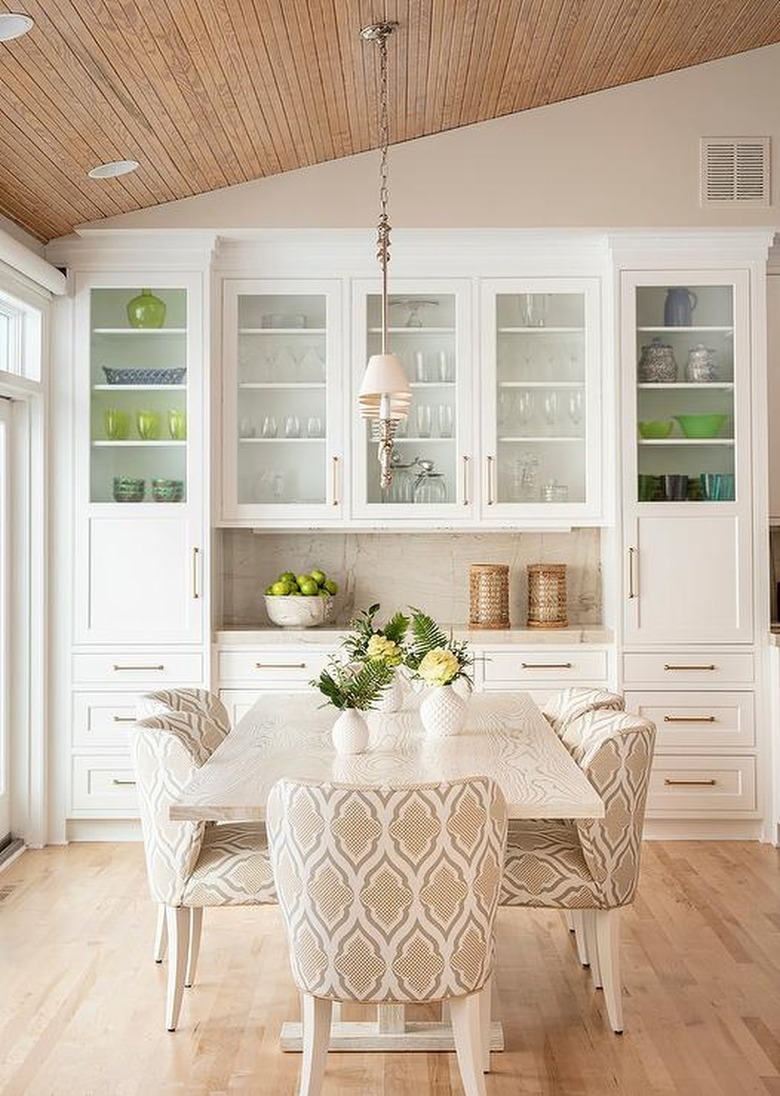 room with beige walls and vaulted ceiling