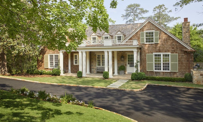 sage green and white trim with cedar shake siding