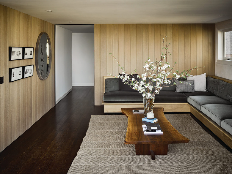 light wood wall paneling with greige wall and ceiling paint color