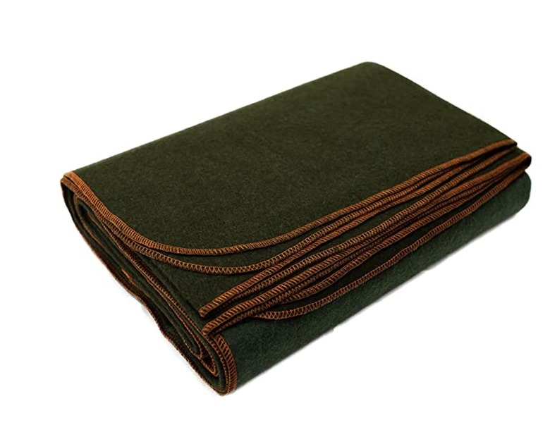 green blanket with orange trim