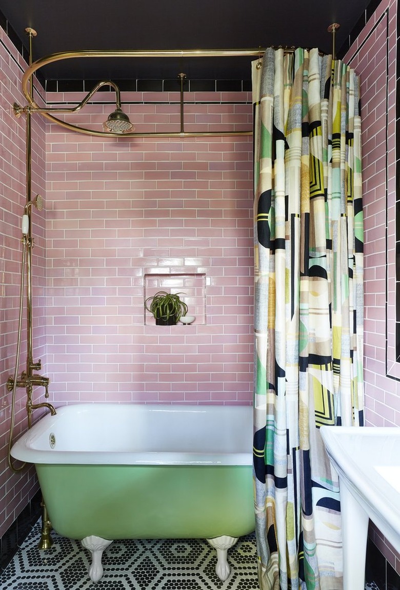 retro bathroom with pink subway tile