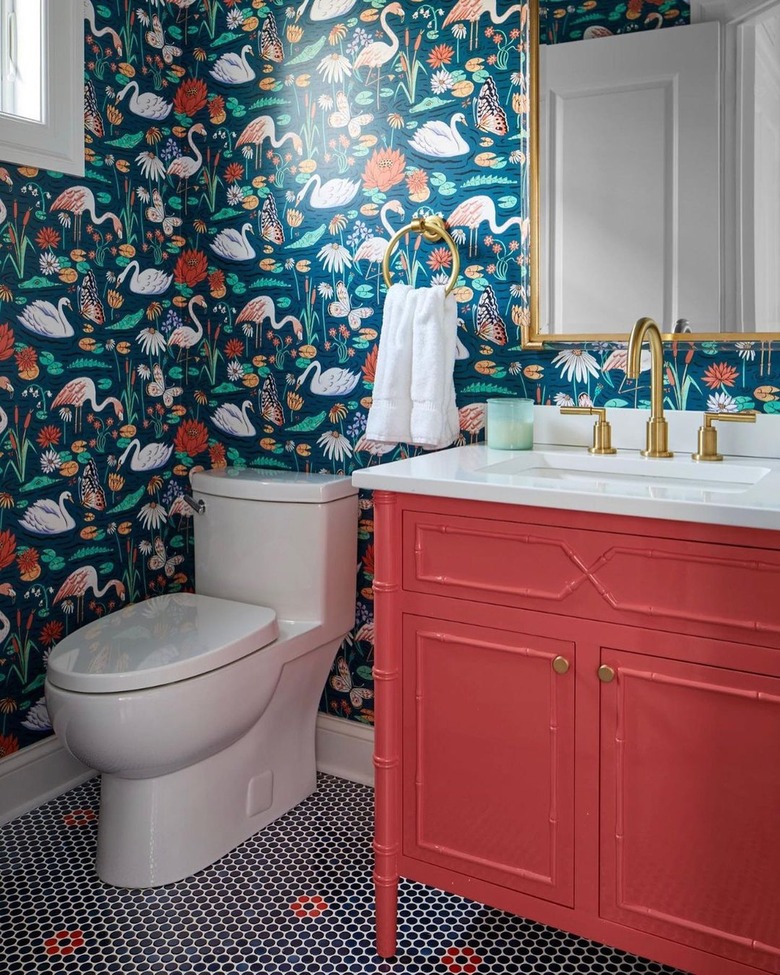 powder room with navy adn red floral flamingo wallpaper