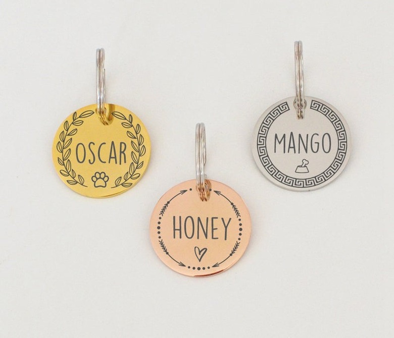 three pet collar tags