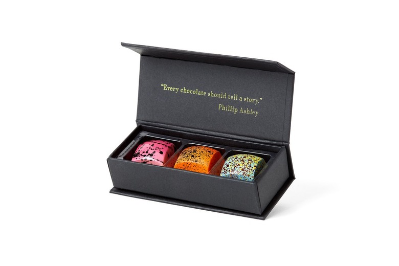 A box of three Philip Ashley Chocolates. Starting from the left